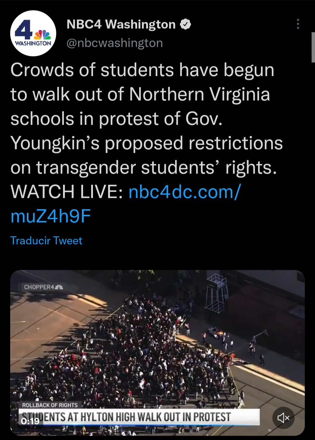 tweet from an NBC4 account reading "Crowds of students have begun to walk out of Northern Virginia schools in protest of Gov. Youngkin’s proposed restrictions on transgender students’ rights." with photo of hundreds of children protesting
