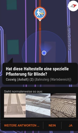 Screenshot von StreetComplete. Oben das Symbol "Mensch mit Blindenstock", unten die Frage: Hat diese Haltestelle eine Markierung für Blinde? Darunter eine Strassenkarte