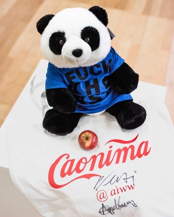 Ai Wei Wei + Jacob Appelbaum: "Panda to Panda" 

Panda dressed to impress with a "Fuck the NSA" Tee, stuffed with shredded Snowden papers and classified documents as well as digital SD memory card backup, smuggled out of China (Where "panda" is also a slang word for the secret police"

Photo by: Moritz Haase