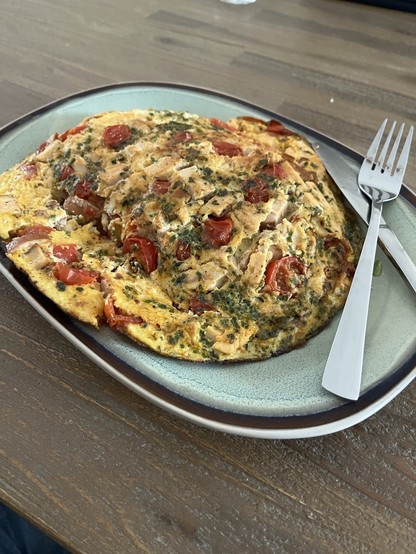 Plate with scrambled eggs & cutlery