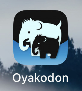 App badge of a large white mastodon and a smaller black one in front of it, both in profile on a blue black gradient. The icon is labeled “oyakodon”. 