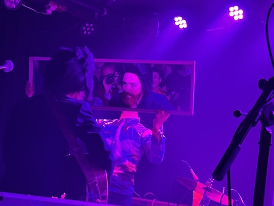 The Vessel performs in a mirror