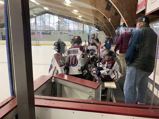 Youth hockey tournament team bench.