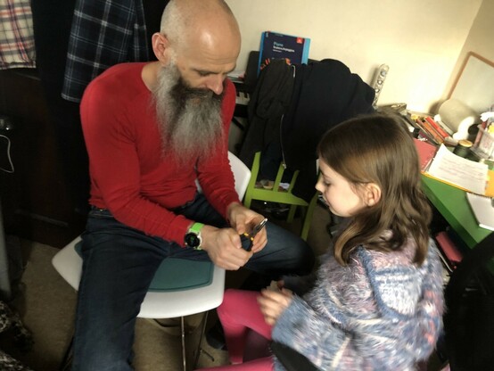 Dad pulling tooth