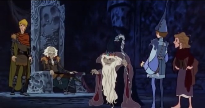 The master sorcerer Mabruk, with his long beard and wizard’s staff, rebukes King Haggard, a lean and hungry-looking old monarch in military garb, who sits on an iron throne, as the adventuring party and his young adult son, Prince Lir, look on. 