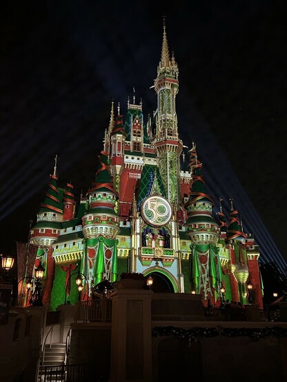 Cinderella Castle at Magic Kingdom with Christmas projection