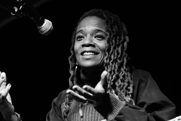 Black and white photo of bassist, vocalist, composer and producer Divinity Roxx 