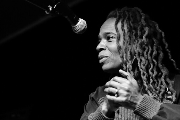 Black and white photo of bassist, vocalist, composer and producer Divinity Roxx
