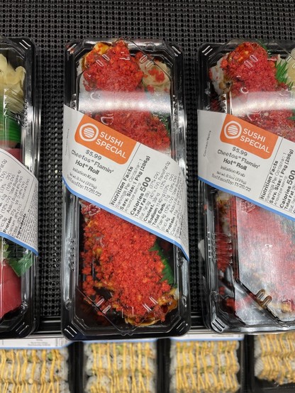 Grocery story sushi with imitation krab and crushed hot Cheetos on top. 