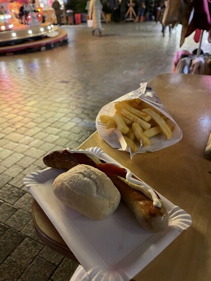Sausage and fries in a Christmas market 