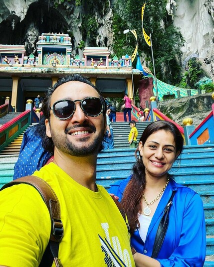 Sourabh Raaj Jain, Sourabh's mother, Hrishivh and Ridhima ma'am climb the temple steps at Batu Caves, Malaysia, in November 2022.