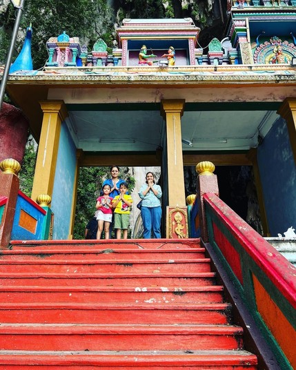 Hrishika, Ridhima ma'am, Hrishivh and Sourabh's mother enter the temple complex at Batu Caves, Malaysia, in November 2022.
