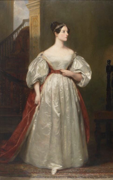 A color portrait of Ada Lovelace. She is standing and looking to her left. Her right hand hangs by her side and her left hand rests on her stomach. She is wearing a long cream-colored or off white gown with a low neckline and puffy sleeves, along with a red train. Lovelace is also wearing a tiara in her brown hair, which is pulled up on the back of her head.