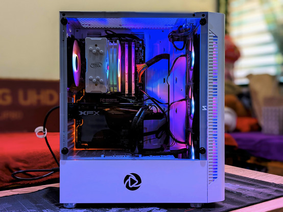 White PC with RGB fans and tempered glass side panel.