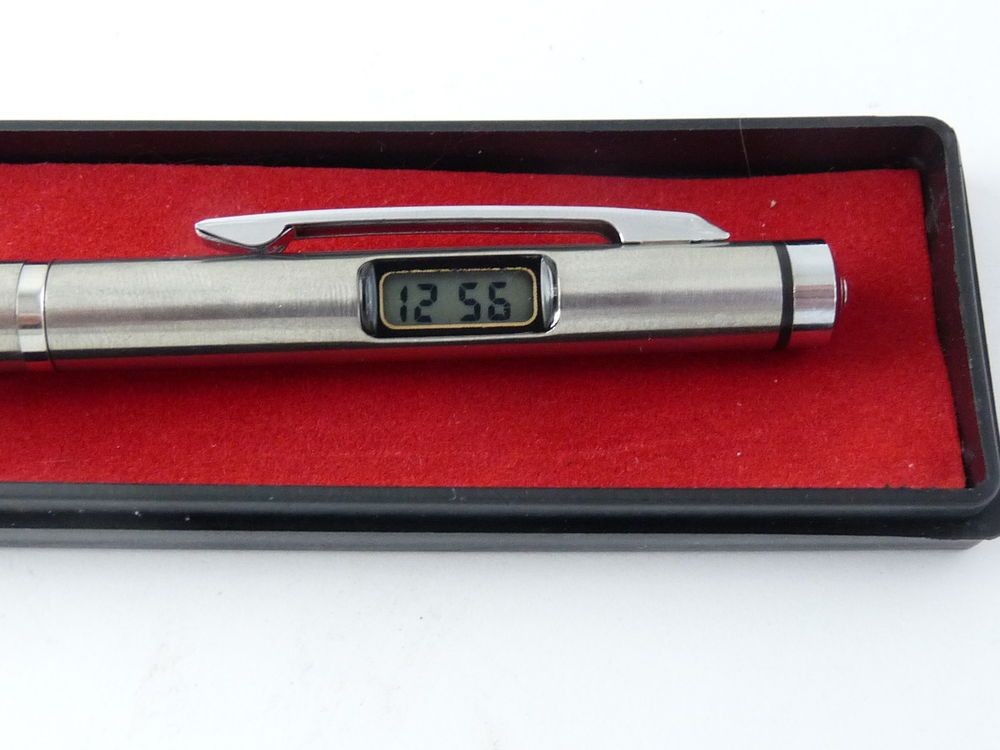 digital clock built into a pen