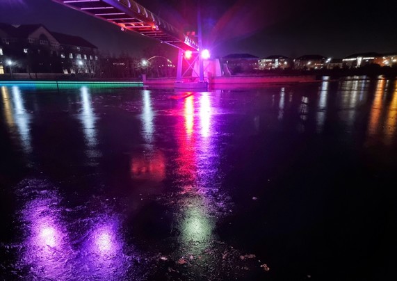 Ice under a bridge.