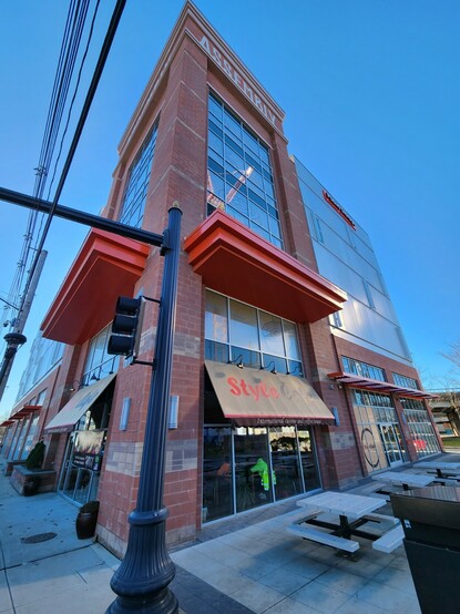 A 5-story self storage building with the Style Cafe restaurant on its first floor