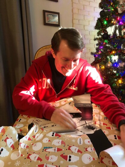 Colarusso opening the Lego set. 