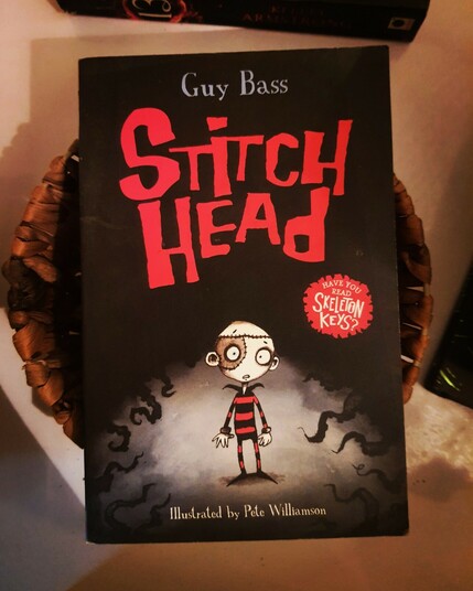 The cutest version of Frankenstein you'll see, complete with a stitched forehead!