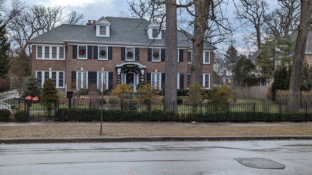 The Home Alone House: large red brick house on a tree-lined street that was featured in the 1990 holiday comedy classic "Home Alone"