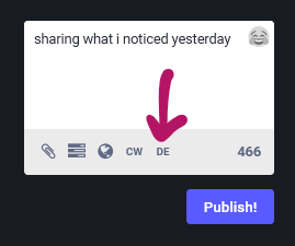 The language setting is the last option below the text input panel. The option will be marked with the abbreviation for the language it is currently set to. Here it is set to German so it is marked "DE". 