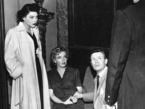 A picture of actresses Marilyn Monroe and Anne Bancroft and actor Richard Widmark in the 1952 noir film “Don’t Bother to Knock”