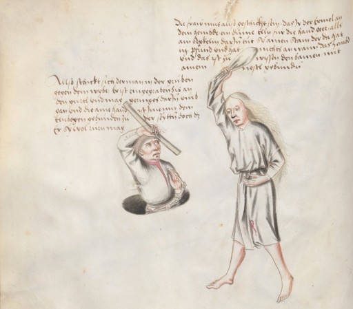Man in a hole with stick in his hand while a woman stands over him about to strike with a stick. 