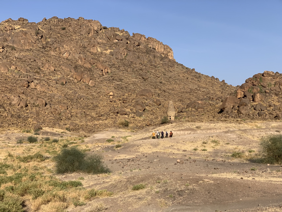 The valley during a very dry spell. The team can be seen in the distance. 