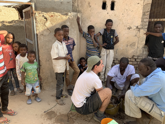 Doing flotation in the village attracts a number of helpers and on-lookers, including children.  