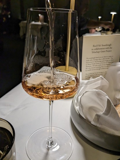 Photo of the rose being poured into the glass