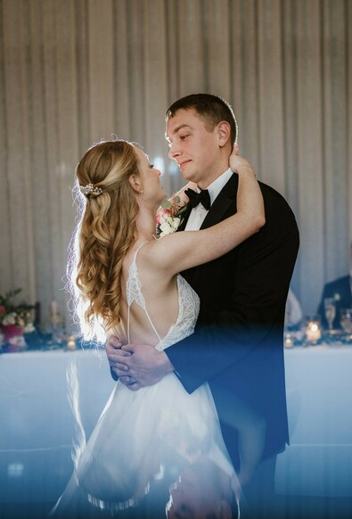 Bride and groom’s first dance at The George and Madcap Lounge (a Milwaukee event venue) on their wedding day. 