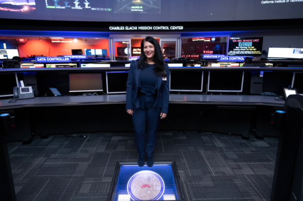 U.S. Poet Laureate Ada Limón is seen standing in NASA’s Jet Propulsion Laboratory’s Space Flight Operations Facility.