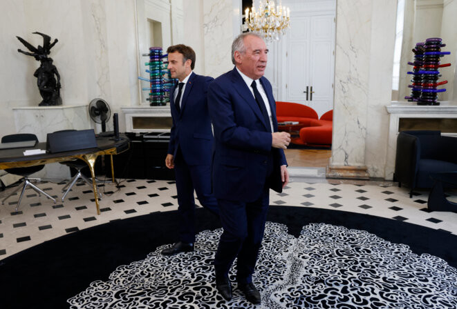 François Bayrou et Emmanuel Macron, le 21 juin 2022, à l’Élysée. © Ludovic Marin/AFP