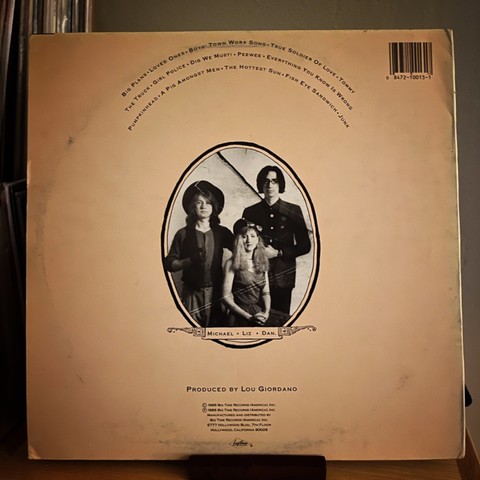 Back record jacket. Band photo styled to look like an old timey photo