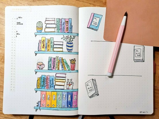 a bullet journal setup with book shelves