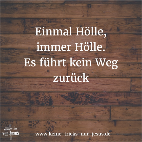 Zu sehen ist ein Untergrund in dunkler Holzoptik. In weißer Schrift ist zu lesen: „Einmal Hölle, immer Hölle. Es führt kein Weg zurück. www.keine-tricks-nur-jesus.de“