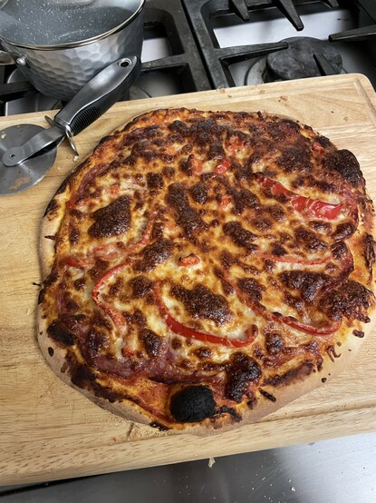 Finished pizza all toasty.