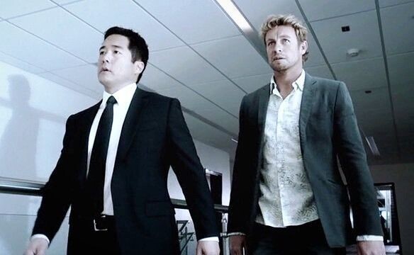 Patrick Jane is escorted into his FBI future by Kimball Cho in season 6 of The Mentalist TV show.