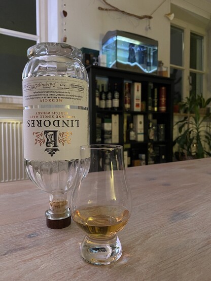 Empty bottle of Whisky upside down
