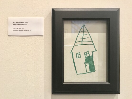 Parents put a frame around the drawing, and make it a feature.