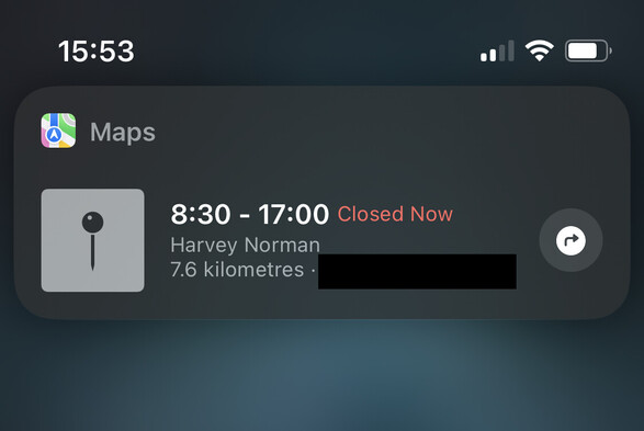 A screenshot of a query to Siri requesting the time that the nearest Harvey Norman store closes today, with the Apple Maps result showing the store has trading hours of 8:30 to 17:00.  The current time is 15:53, but despite this the Apple Maps summary in Siri incorrectly shows the business as Closed Now.