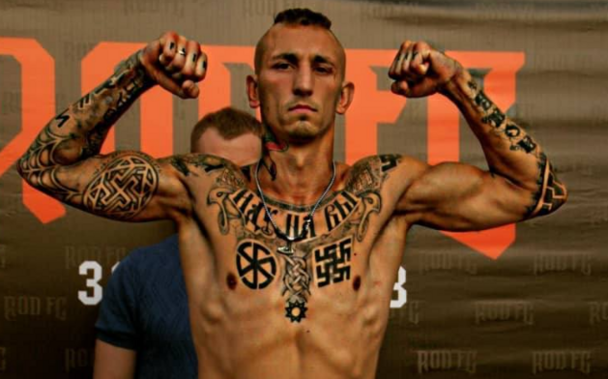 Russian Nazi Mikhail Turkanov showing up his Nazi tattoos when lining up for MMA fight