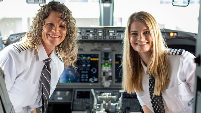 Wearing their uniforms and smiling, Captain Holly Petitt and First Officer Keely Petitt  are shown turning in their seats in the cockpit, to face the camera.

They flew their first flight together from Denver to St. Louis, where the two are from. This flight marked the first mother-daughter duo to ever fly for Southwest Airlines.

Photograph by Schelly Stone