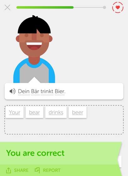 Screenshot from Duolingo. It pictures a young boy mouth wide open, smiling.

The text to be translated is: “Dein Bär trinkt Bier”.

Underneath is the suggested answer: “Your bear drinks beer”.

On the bottom of the screen in green are the words “You are correct”.
