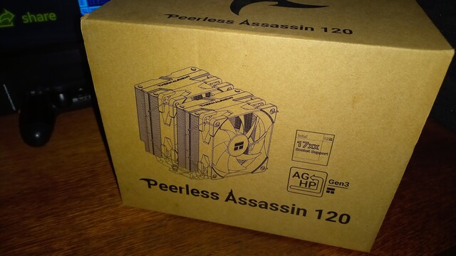 Thermalright Peerless Assassin 120 CPU cooler in a box.