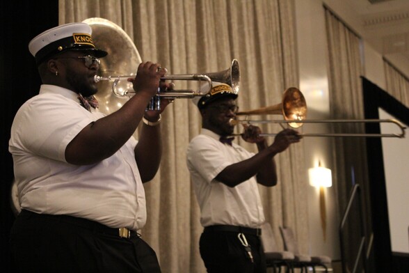 Knockaz Brass Band playing music at IAC23