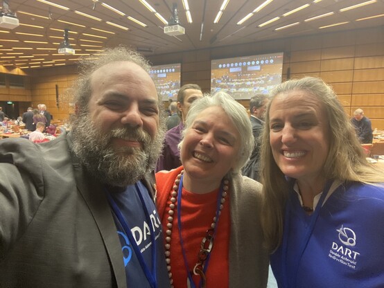 Andy, Elisabetta, and Nancy in the meeting room.