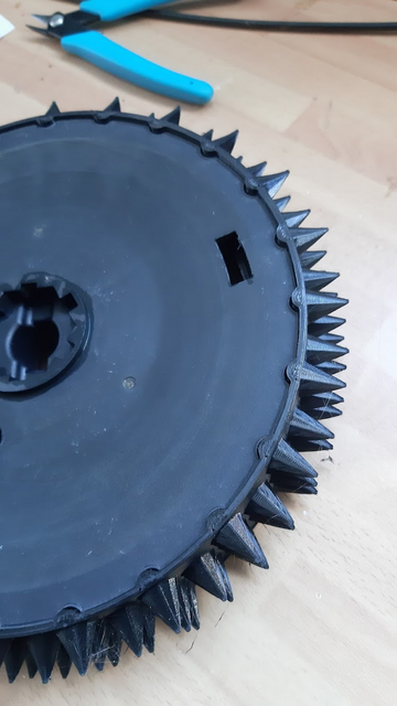 spiked wheel for lawnmower