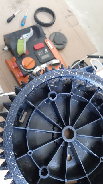 spiked wheel for lawnmower