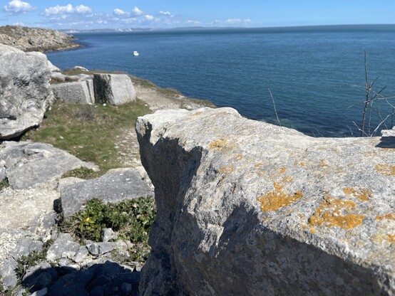 Lots of big pieces of granite sitting 300 feet above a glistening and blue English Channel on a fantastic sunny April Friday